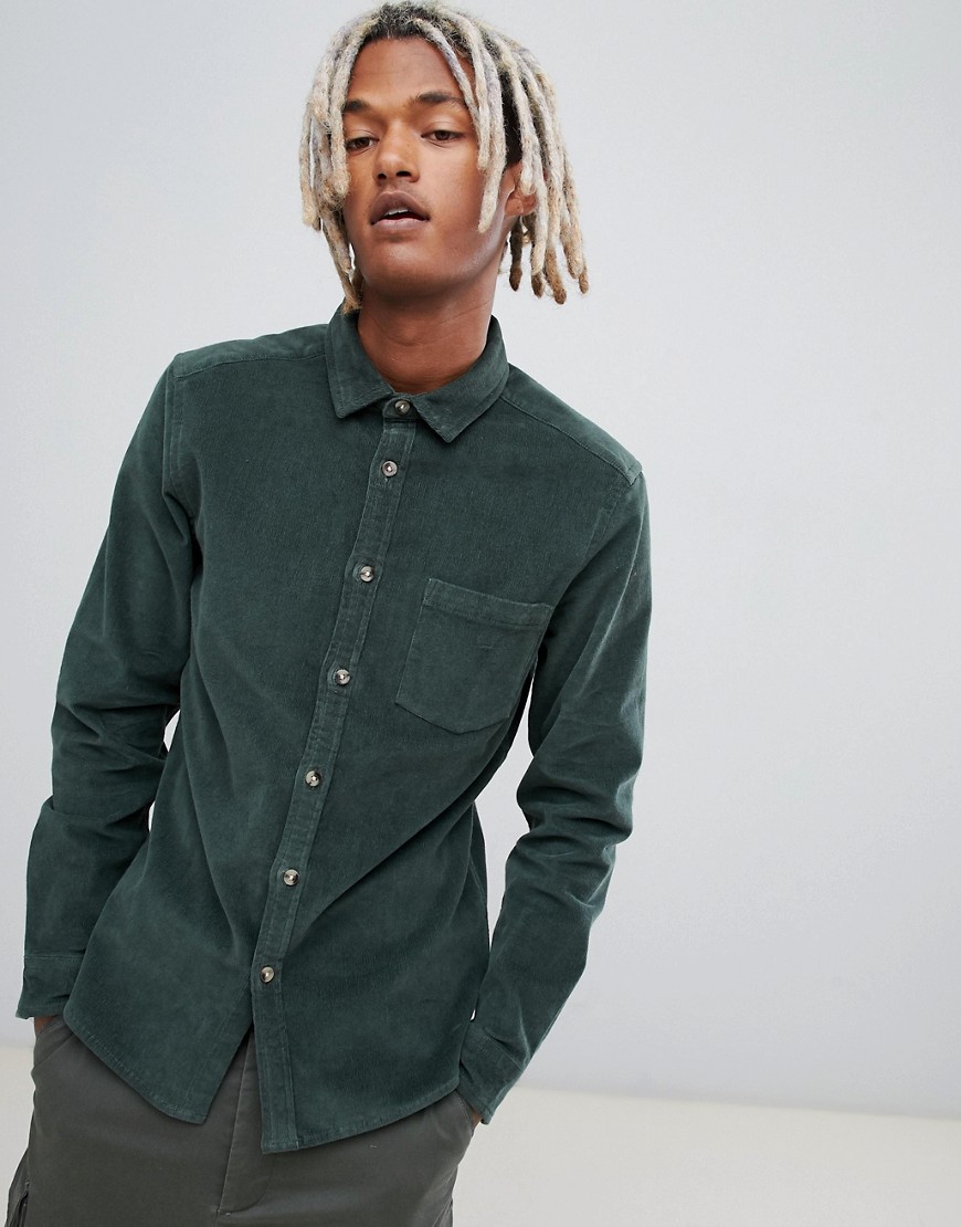 ASOS DESIGN slim fit stretch cord shirt in green | The Fashionisto