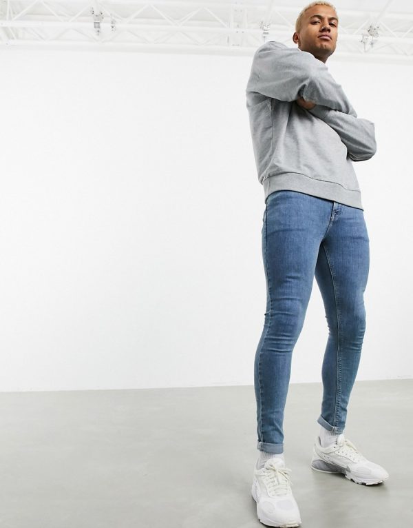 asos design baggy jeans in vintage light wash blue