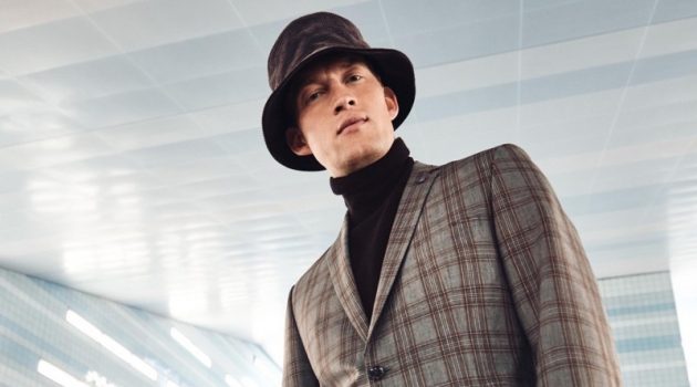 Bastian Thiery sports a checked suit with a turtleneck sweater and bucket hat for Anson's fall-winter 2020 campaign.