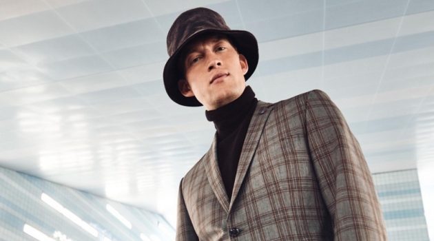 Bastian, Selle & Christoffer Front Anson's Fall '20 Campaign Bastian Thiery sports a checked suit with a turtleneck sweater and bucket hat for Anson's fall-winter 2020 campaign.