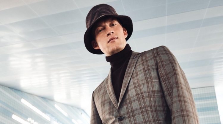 Bastian Thiery sports a checked suit with a turtleneck sweater and bucket hat for Anson's fall-winter 2020 campaign.