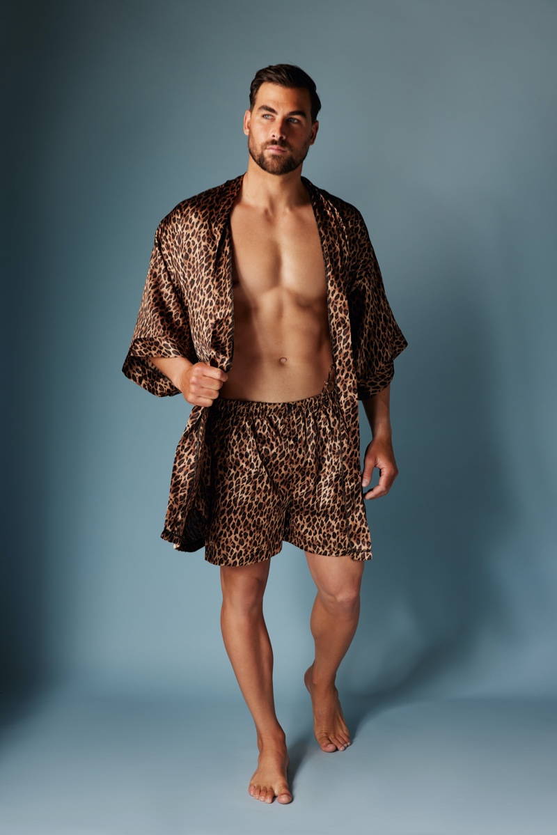 Making a bold statement, Marc Jacobs models a matching satin leopard robe and boxers by Frederick's of Hollywood.