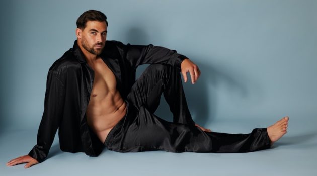 Frederick's of Hollywood Debuts Men's Collection Model Marc Jacobs wears a black satin pajama set from Frederick's of Hollywood.