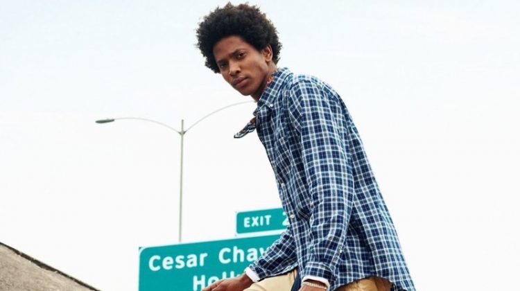Rafael Mieses dons a plaid shirt with chinos for GANT's fall-winter 2020 campaign.