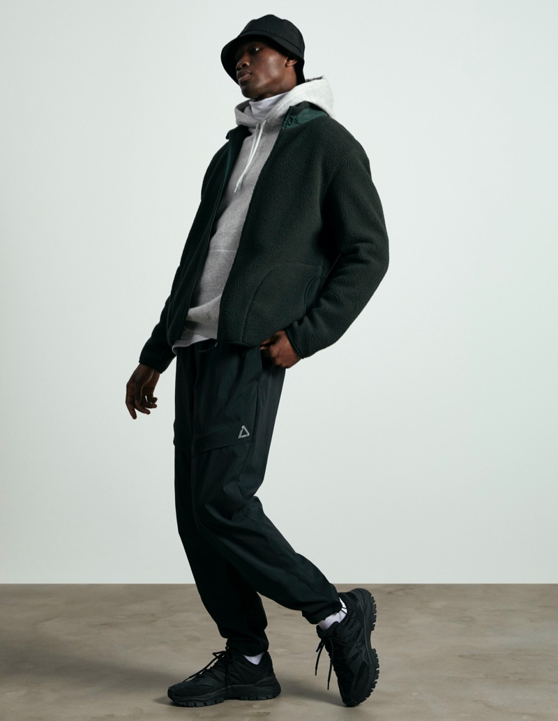 Jean-Jacques Okaingi sports Heat Up Tech layers by H&M.