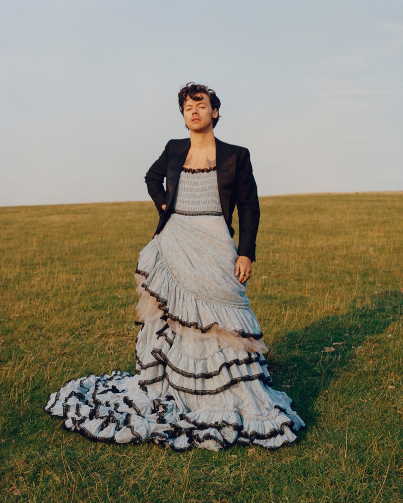 Harry Styles dons a dress and tuxedo jacket from Gucci for the pages of American Vogue.