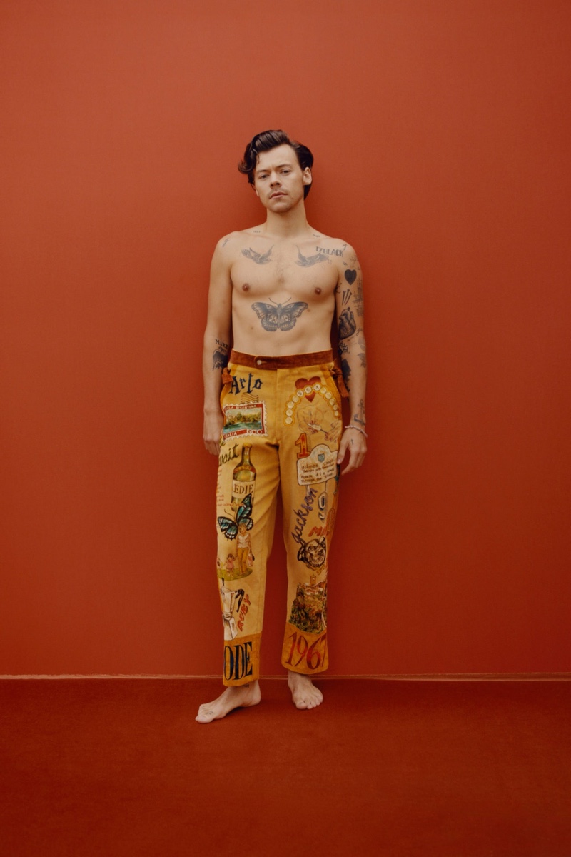 Going shirtless for Vogue, Harry Styles shows off his tattoos and custom-made corduroy pants from Emily Adams Bode.