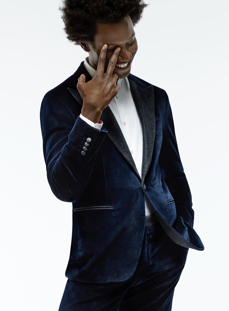 All smiles, Adonis Bosso wears a Canali velvet tuxedo jacket for Holt Renfrew's fall-winter 2020 campaign.