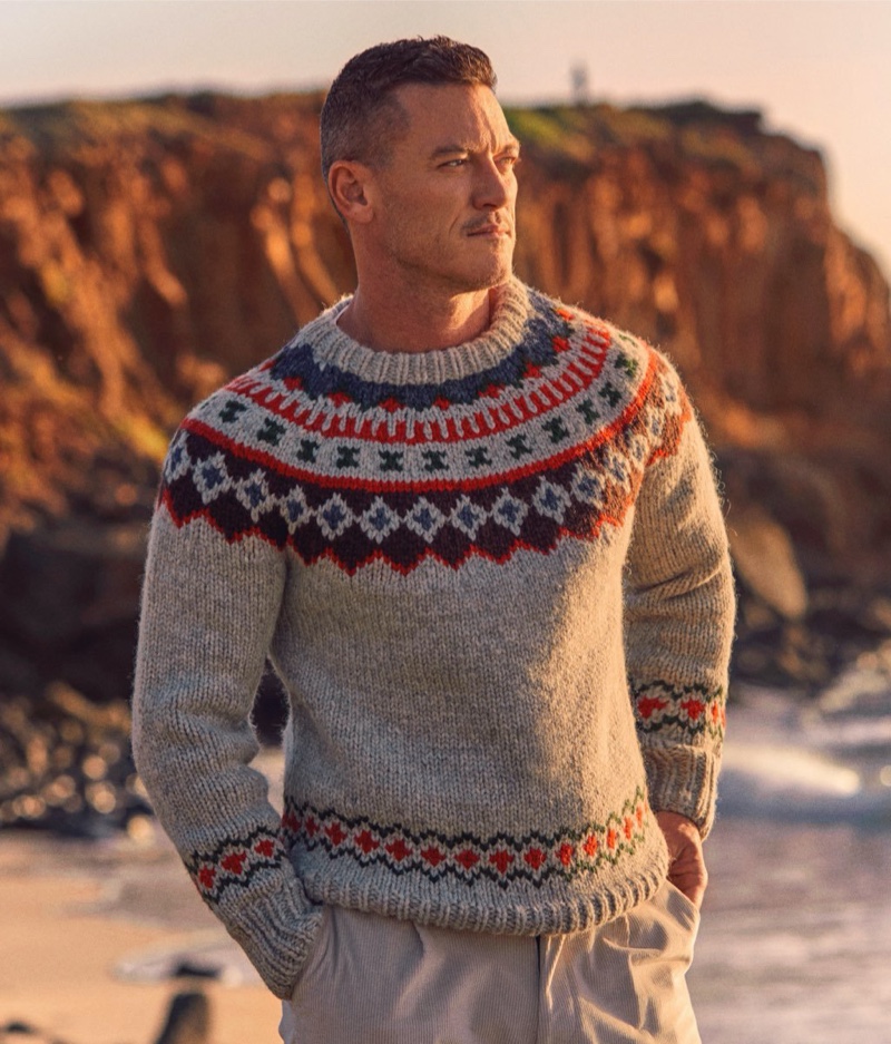 Linking up with Todd Snyder for the season, Luke Evans wears the brand's Canada fair isle sweater.