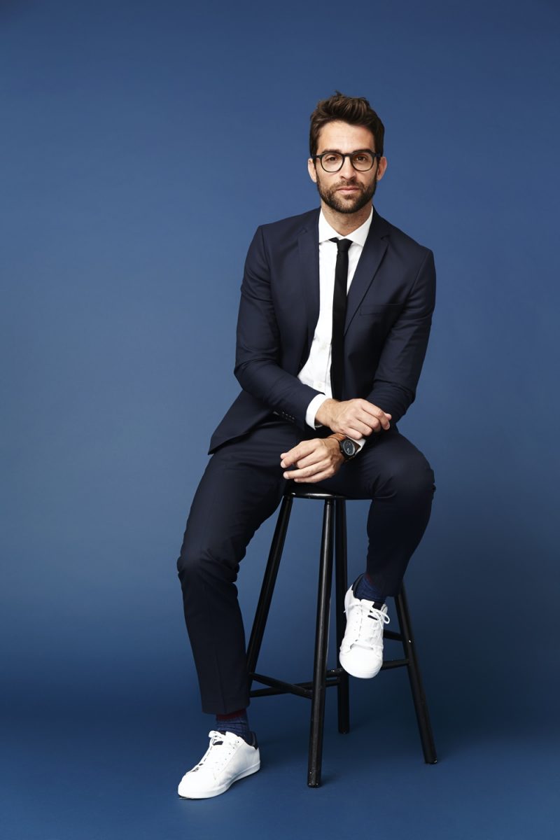 Male Model Suit and Sneakers Wearing Glasses
