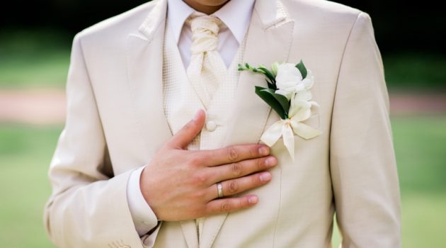 History of Wedding Rings for Men and Women Man Groom Wedding Beige Suit Ring