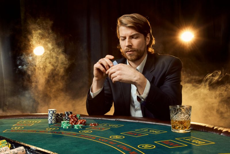 Man Playing Black Jack Man Playing Black Jack