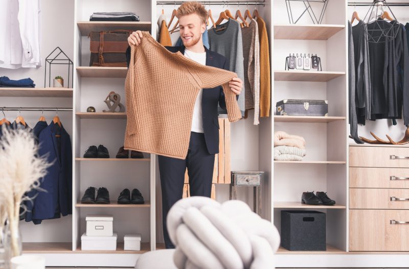 Mens Closet Looking at Sweater