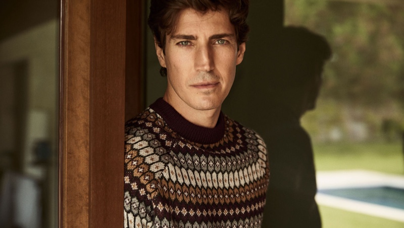 Front and center, Oriol Elcacho dons a fairisle sweater from Pedro del Hierro.