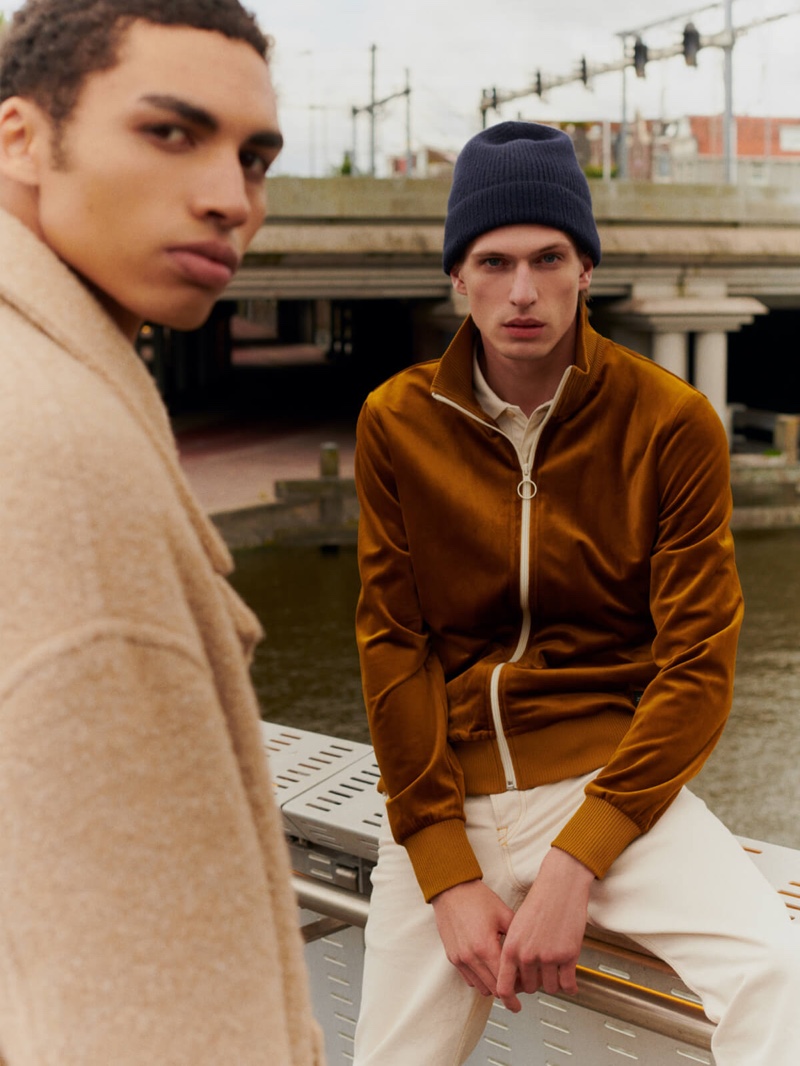 Edoardo Sebastianelli sports a festive track jacket from Scotch & Soda.