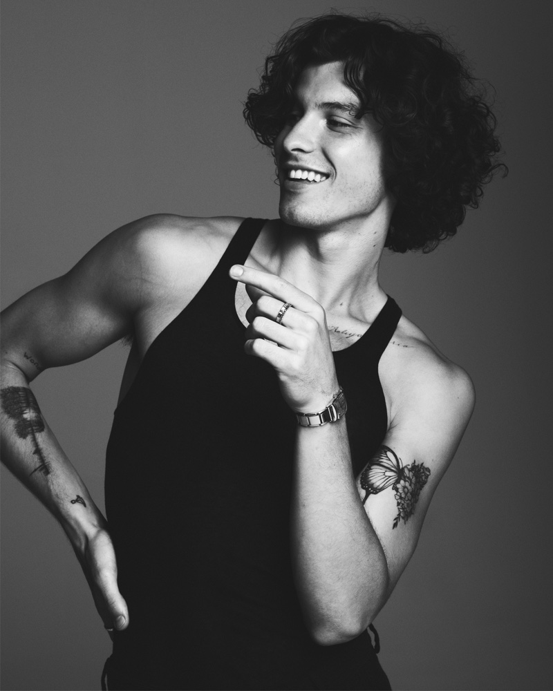 Smiling, Shawn Mendes wears a Calvin Klein tank with Emporio Armani pants for VMAN. » Shawn Mendes Covers VMAN, Discusses Fourth Album Smiling, Shawn Mendes wears a Calvin Klein tank with Emporio Armani pants for VMAN.