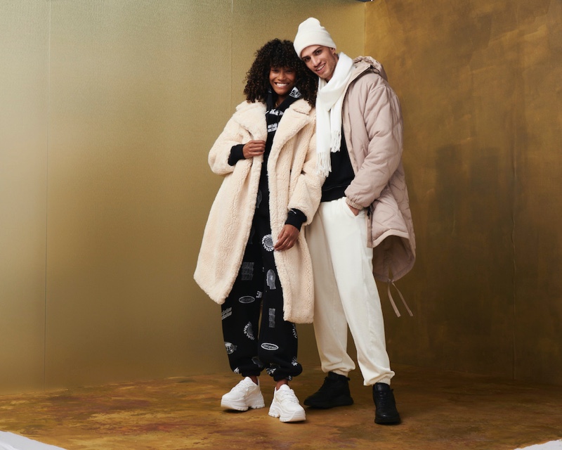 All smiles, couple Chey Maya and Ashton Gohil appear in Topman's holiday 2020 campaign.