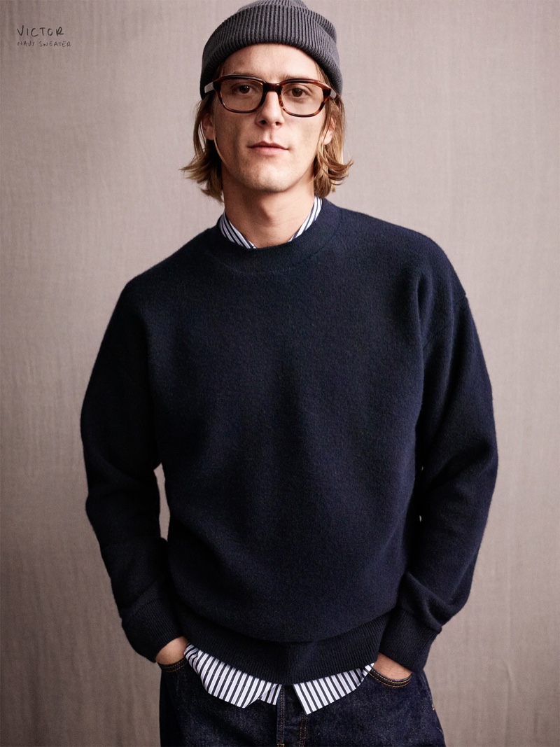 Victor sports a navy sweater from the Zara Edition collection.