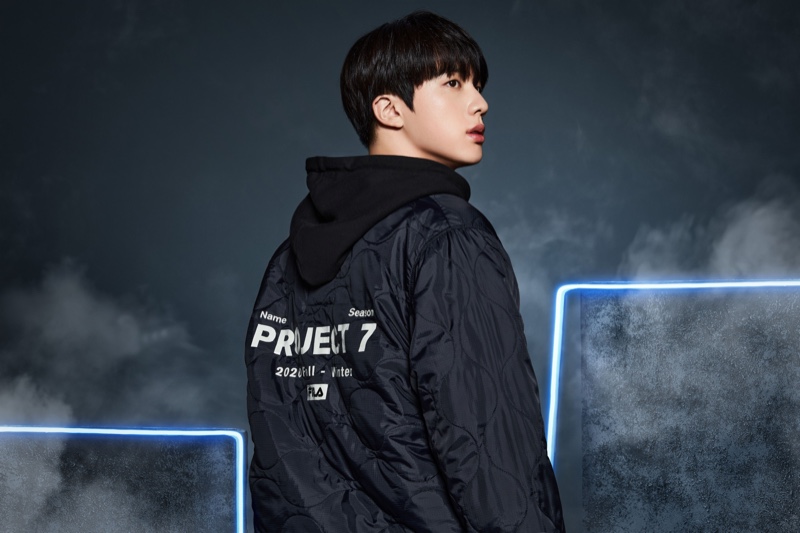 Jin sports FILA's Project 7 lightweight quilted jacket for the collection campaign.