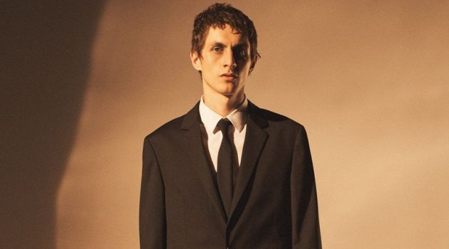 Henry & Nathaniel Front COS Holiday '20 Campaign Henry Kitcher dons a sleek suit for COS' holiday 2020 men's campaign.