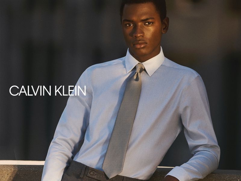 Daniel Morel dons a smart shirt and tie for Calvin Klein's fall-winter 2020 campaign.