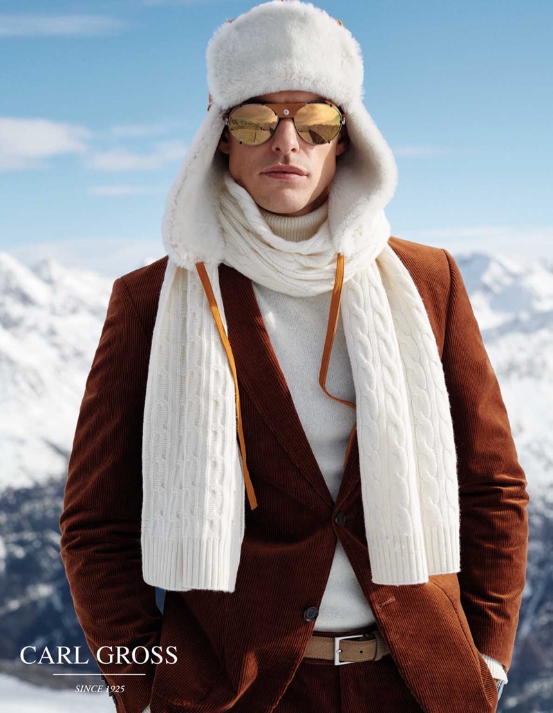 Filip Wolfe styles a sharp Carl Gross look with a trapper hat and cable-knit scarf.