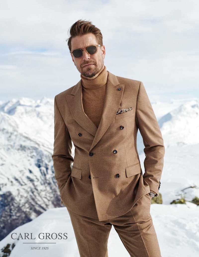 Dressed to impress, Bertil Espegren models a double-breasted suit with a turtleneck sweater from Carl Gross.