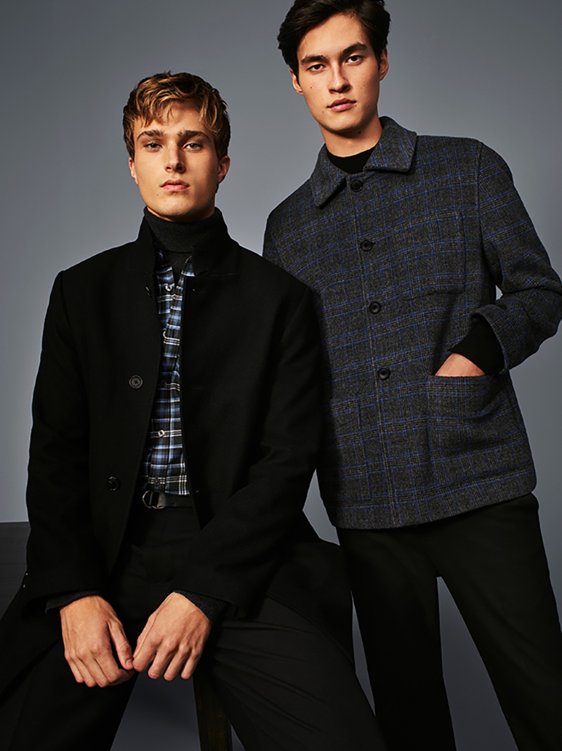 Donning dark hues, Cypress Hayunga and Douglas Dillon front Club Monaco's holiday 2020 campaign.