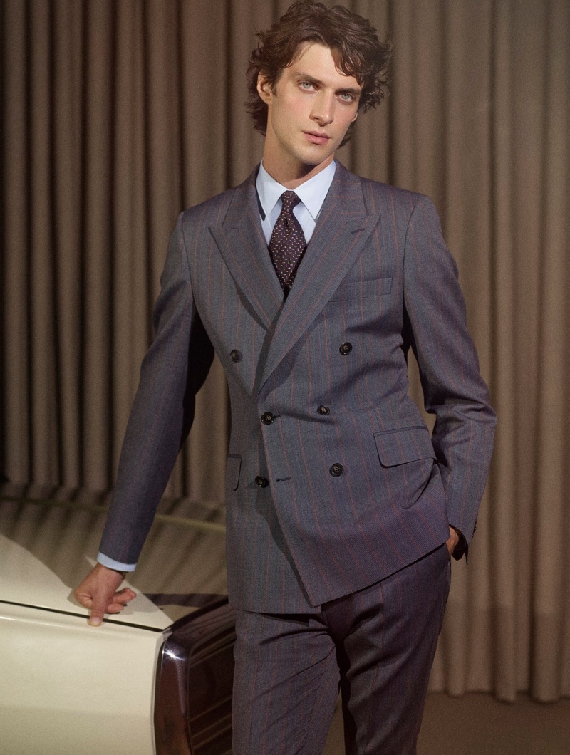 Donning a chic double-breasted suit, Matthew Bell fronts De Fursac's fall-winter 2020 campaign.