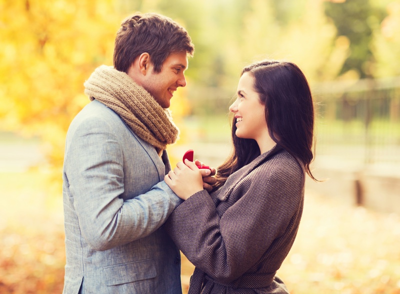Engaged Couple Smiling Outdoors Fall Jackets