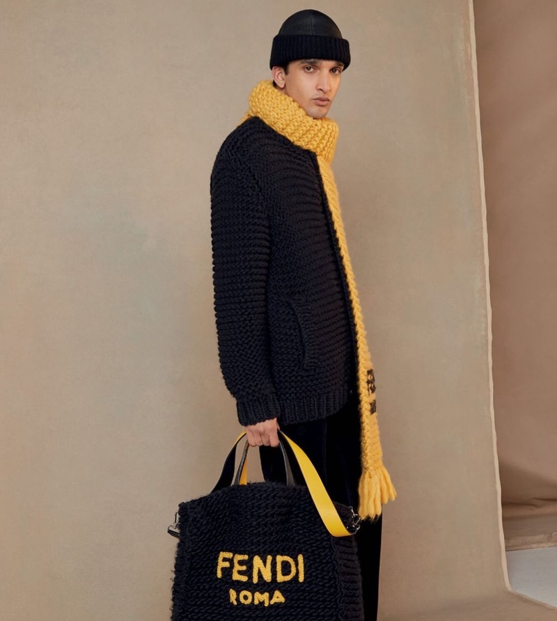 Making a case for warm knitwear, Noah Sapon sports a cozy look from Fendi's fall-winter 2020 collection.