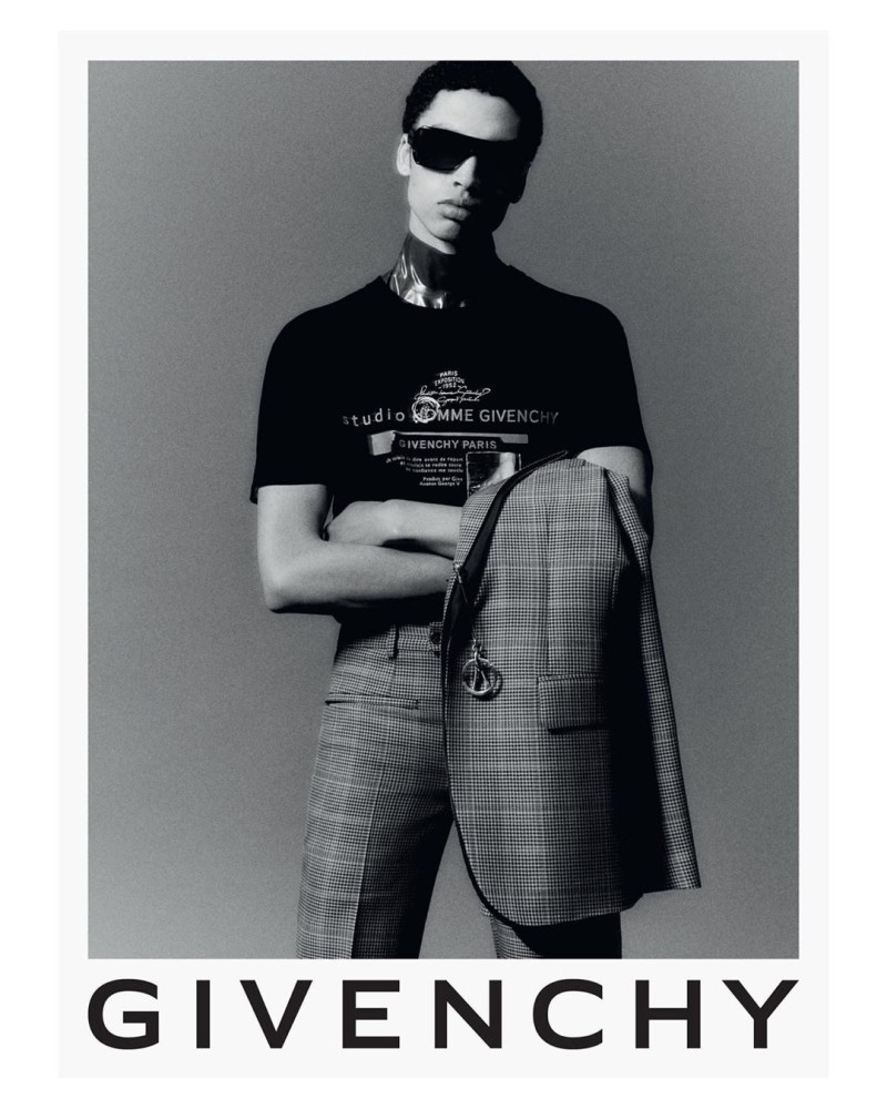 Sol Goss dons a suit with a logo tee for Givenchy's fall-winter 2020 campaign.