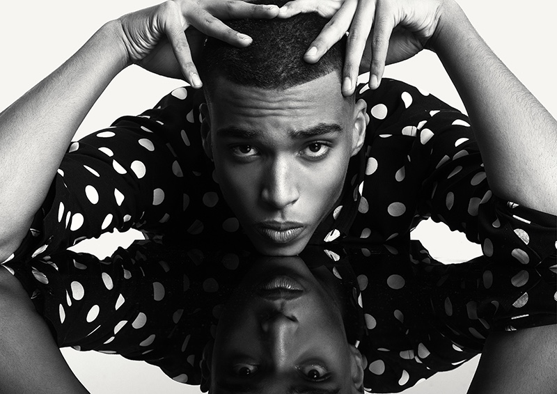 Front and center, Jerome sports a polka dot shirt from Sandro.