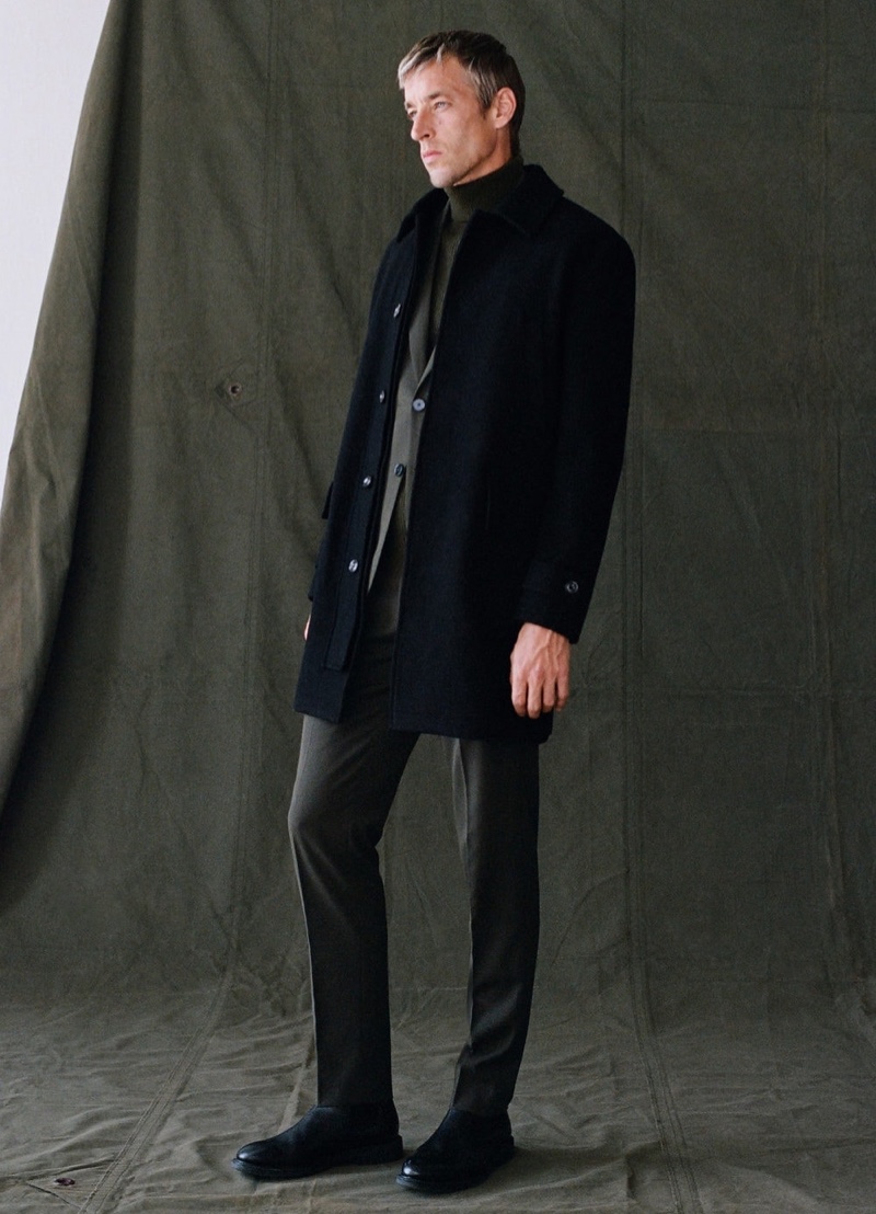 Joel Frampton dons a long recycled wool coat from Mango.