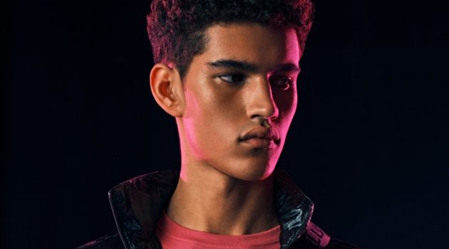 Karl Lagerfeld Celebrates Holidays with KARLXYOU Collection Model Bodhi Heeck sports Karl Lagerfeld's K/Ikonik metallic belt bag for the brand's holiday 2020 campaign.