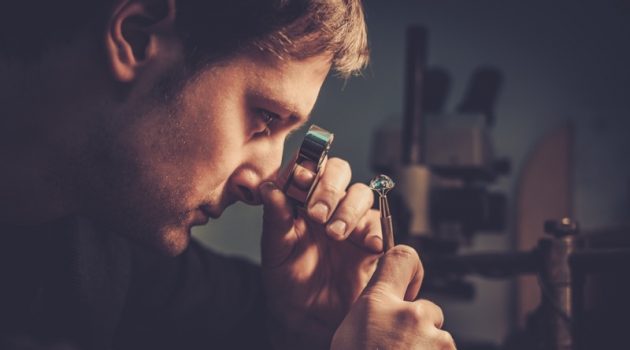 The Diamond Exchange: What is The Resale Value of a Diamond? Man Examining Diamond Gemologist