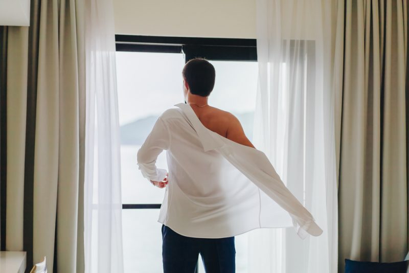 Man Getting Dressed Man Getting Dressed
