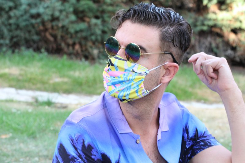 Man in Hawaiian Shirt and Print Face Mask Man in Hawaiian Shirt and Print Face Mask