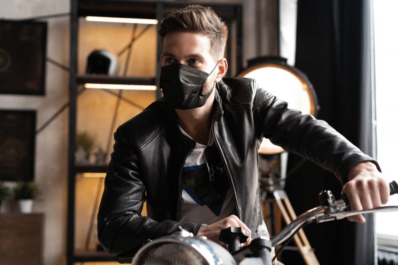 Man in Leather Jacket and Black Face Mask Man in Leather Jacket and Black Face Mask