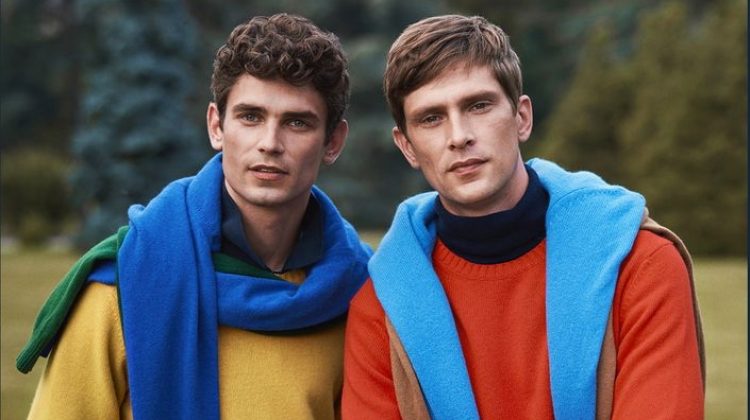 Models Arthur Gosse and Mathias Lauridsen don colorful sweaters for OVS PIOMBO's fall-winter 2020 campaign.