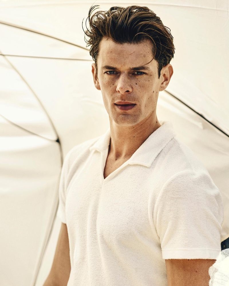 Lewis Jamison sports Orlebar Brown's Marden Towelling white tailored fit polo shirt.