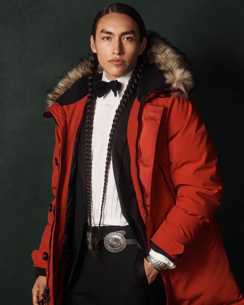 Phillip Bread models a dapper look with a red parka from POLO Ralph Lauren.