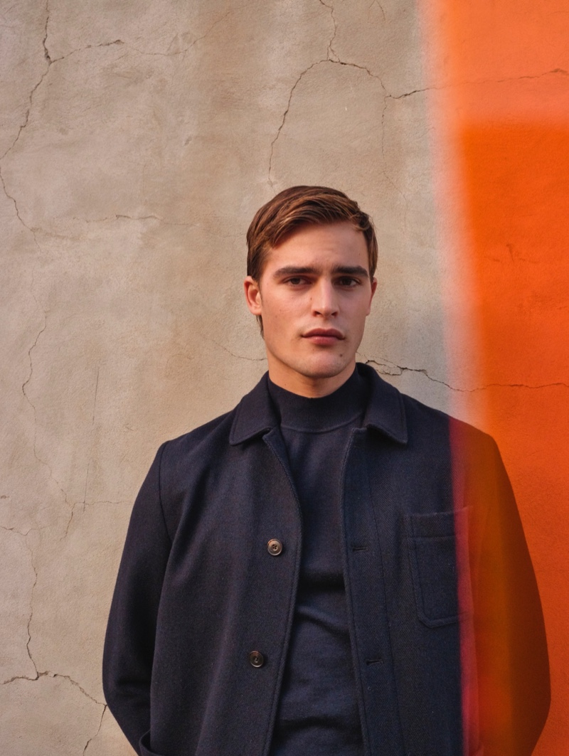 Parker van Noord dons a coat and mock neck sweater from Massimo Dutti.