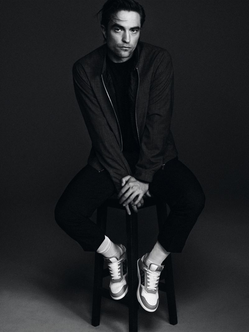 Sitting for a portrait, Robert Pattinson wears a spring-summer 2021 look from Dior Men.