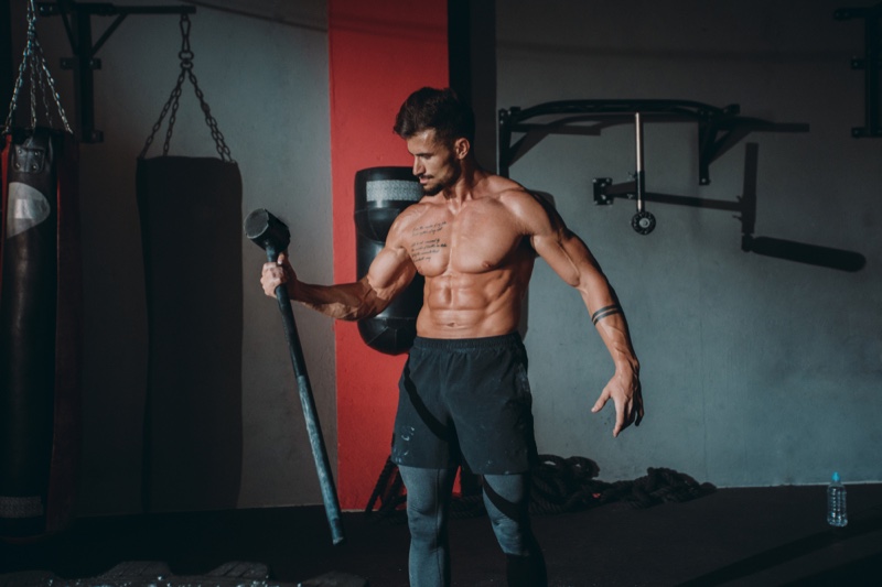 Shirtless Male Model Working Out Gym