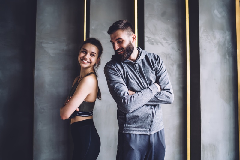 Smiling Couple Wearing Activewear