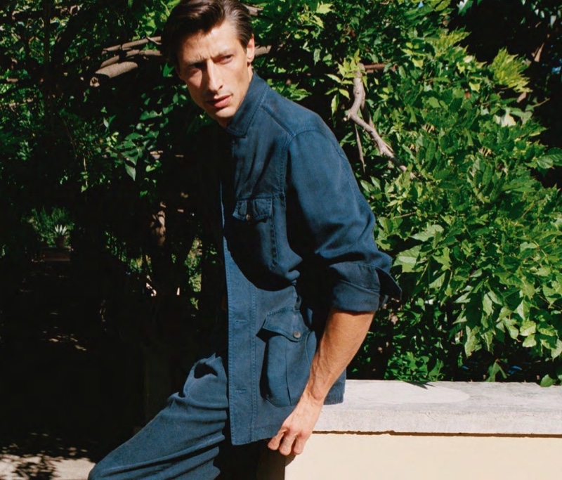 Model Jonas Mason sports a blue linen look from Brioni's spring-summer 2021 men's collection.