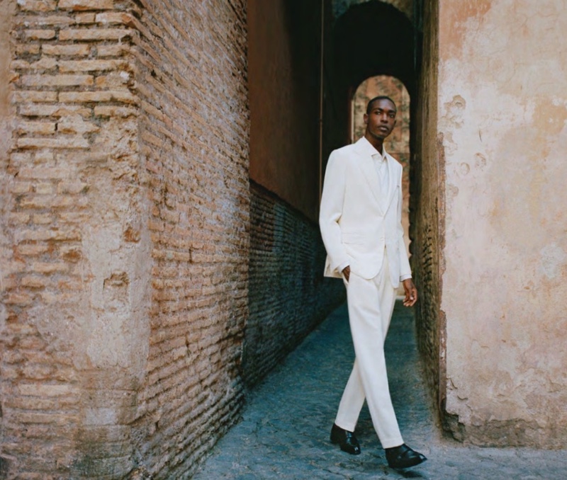 Sharif Idris stands out in a stunning off-white suit from Brioni's spring-summer 2021 men's collection.