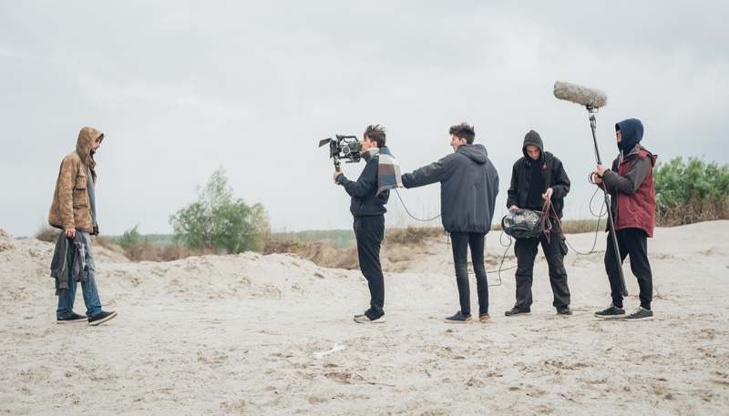 Camera Crew Filming Man