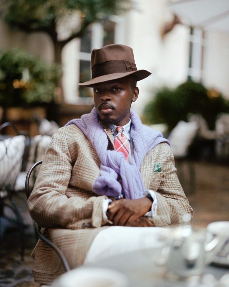 Showcasing a dandy appeal, Kevis Manzi wears a spring look from POLO Ralph Lauren's Heritage Icons collection.